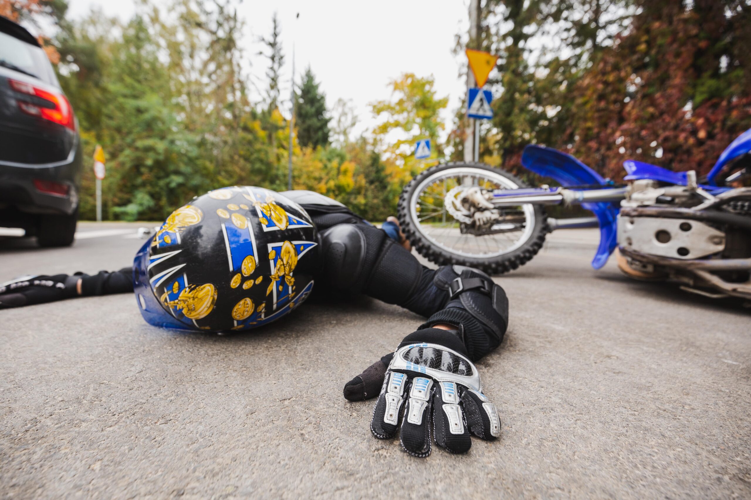 Man wearing a motorcycle helmet, symbolizing safety and legal strategies for motorcycle accident lawsuits on Conlogue Law.